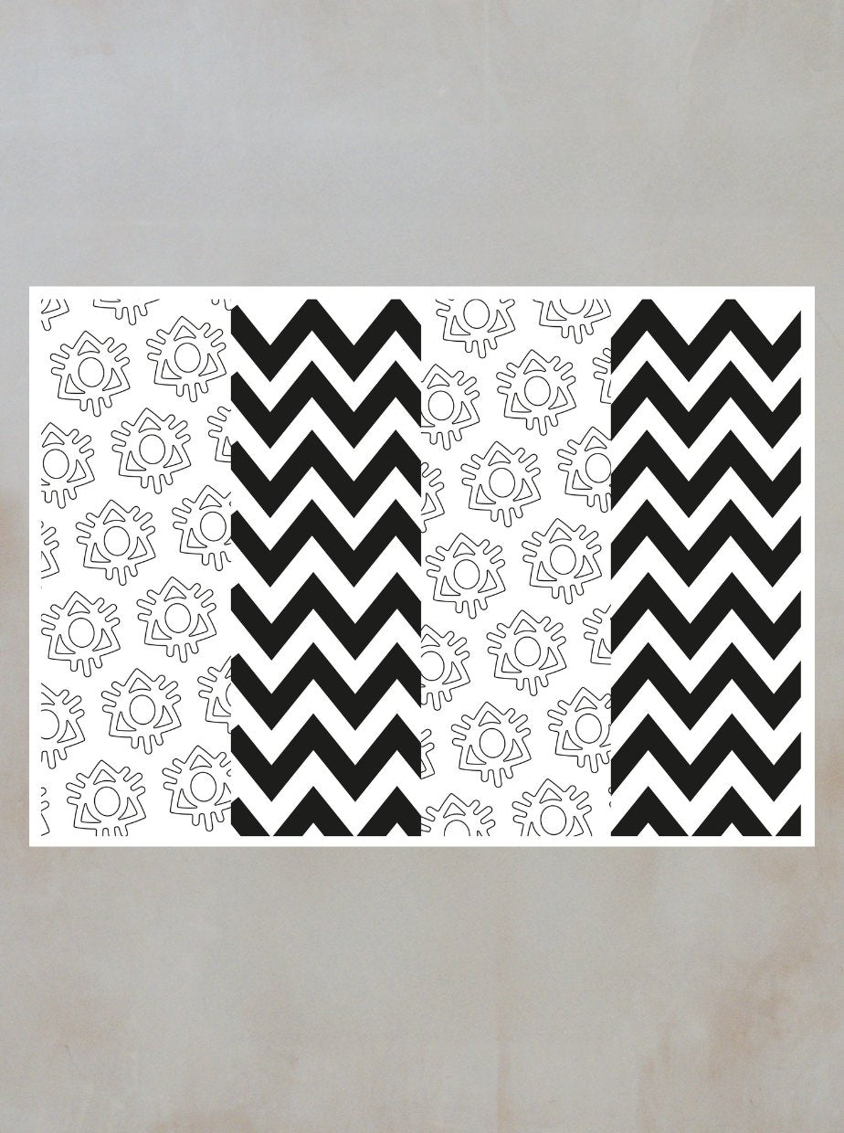 A rectangular image with four vertical sections—black and white chevron stripes and sun doodles—captures the bold, playful style of Boomtown Fair Shops Colouring Book in a dynamic geometric pattern.