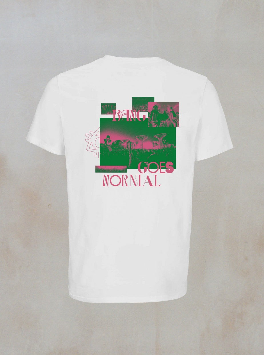 The Bang Goes Normal White Graphic T-Shirt from Boomtown Fair Shop features a green and pink abstract back graphic with bold BANG GOES NORMAL text, blending blocks and illustrations for a unique look.