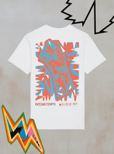 The Power of Now Chroma T-Shirt from Boomtown Fair Shop is a white organic cotton tee featuring a bold, colorful raised fist graphic with abstract shapes, lightning bolts, and BOOMTOWN and POWER OF NOW text.