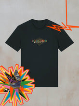 The Boomtown Fair Shops Chapter Four: Power of Now graphic t-shirt is made from organic black cotton and features a vibrant, colorful logo with abstract starburst shapes in orange, red, and yellow at the center.