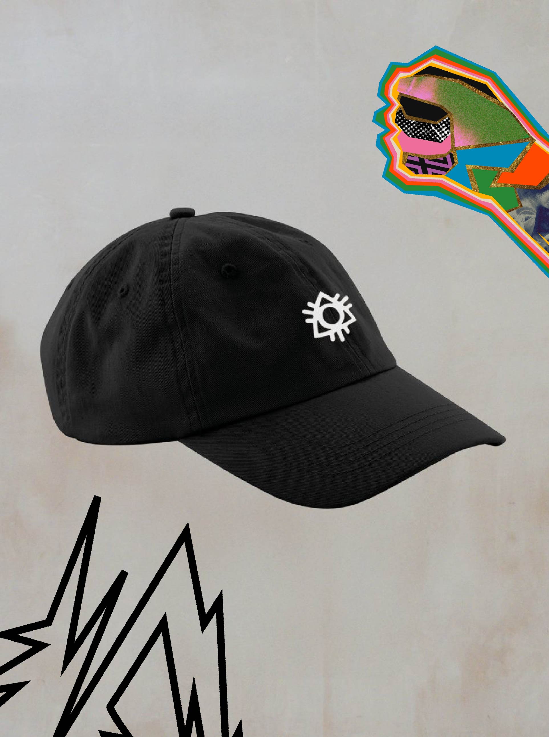 The Boomtown Fair Shop Dad Cap in black features a white embroidered abstract eye logo, bold graphic accents, and a colorful stylized fist on a light background. An adjustable strap ensures comfort and the perfect fit.